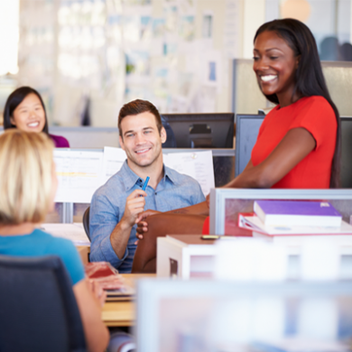 people sat at desks in an office